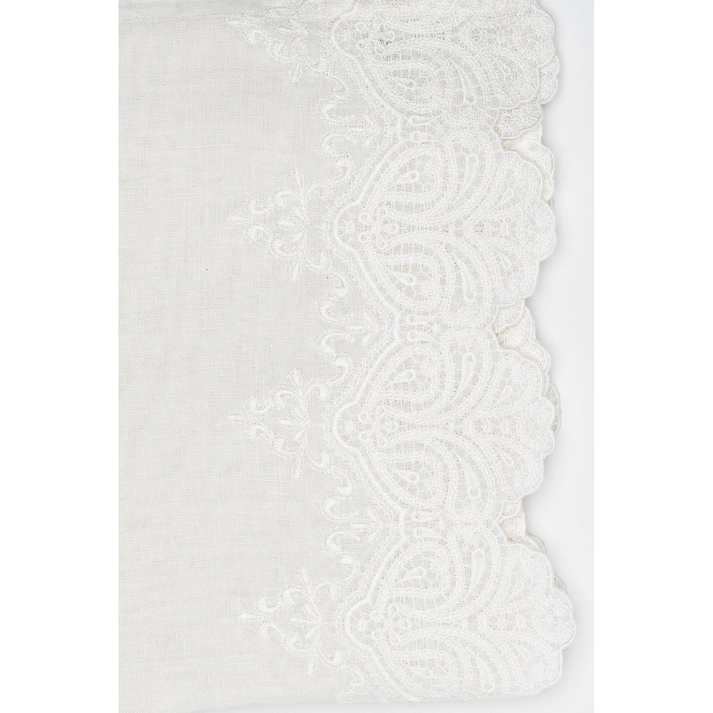Julia tablecloth is made of 100% linen with a large embroidery in the middle and 2 large embroidered scalloped borders along the length. The simplicity of the linen and the luxury of the embroidery give this tablecloth its well-deserved stunning looks!