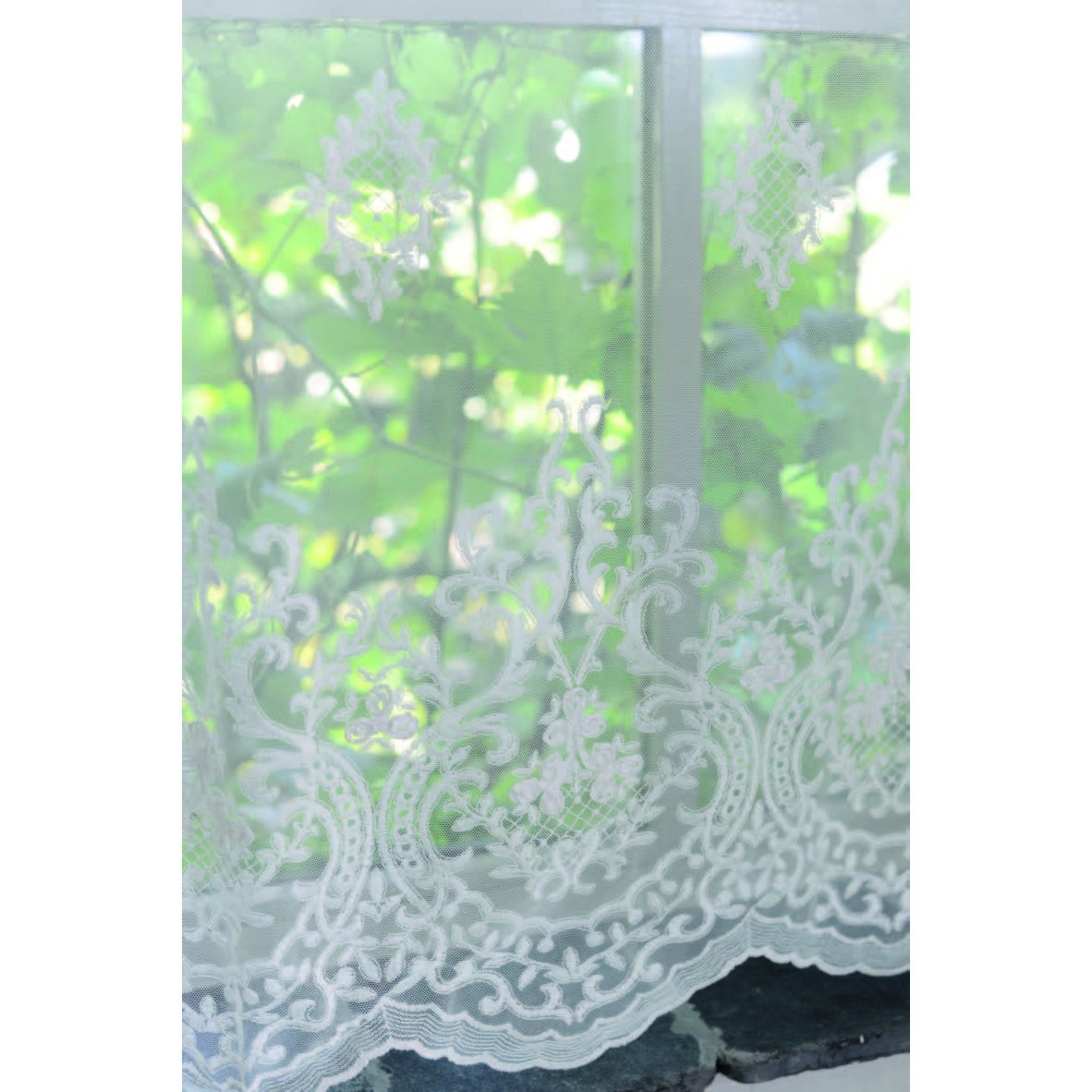 Elegant off-white lace curtain with intricate embroidery.